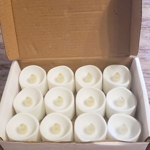 12 LED Tea lights Warm white light battery included.